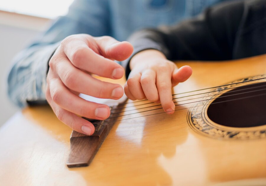 A beginner learning guitar